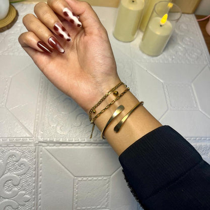 Trendy Gold Bracelet Set: Elegant Layered Wristband Combo for Women